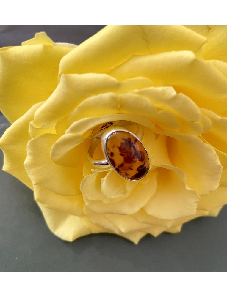 Oval Silver and Golden Baltic Amber Ring